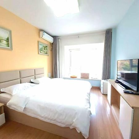 Qingdao Mi Apartment Bagian luar foto