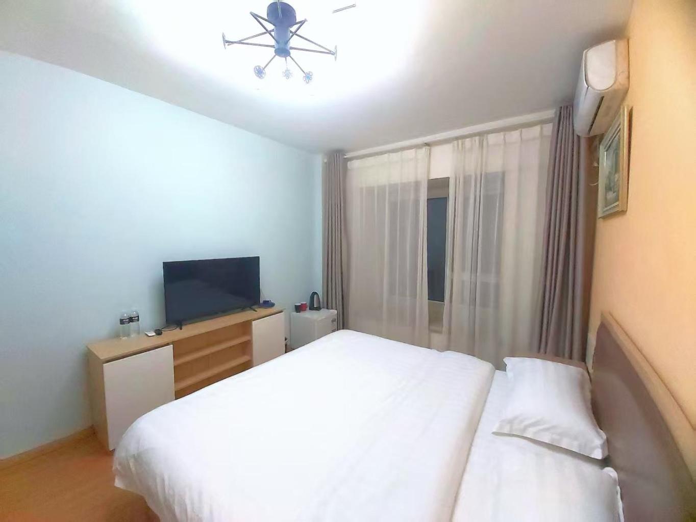 Qingdao Mi Apartment Bagian luar foto