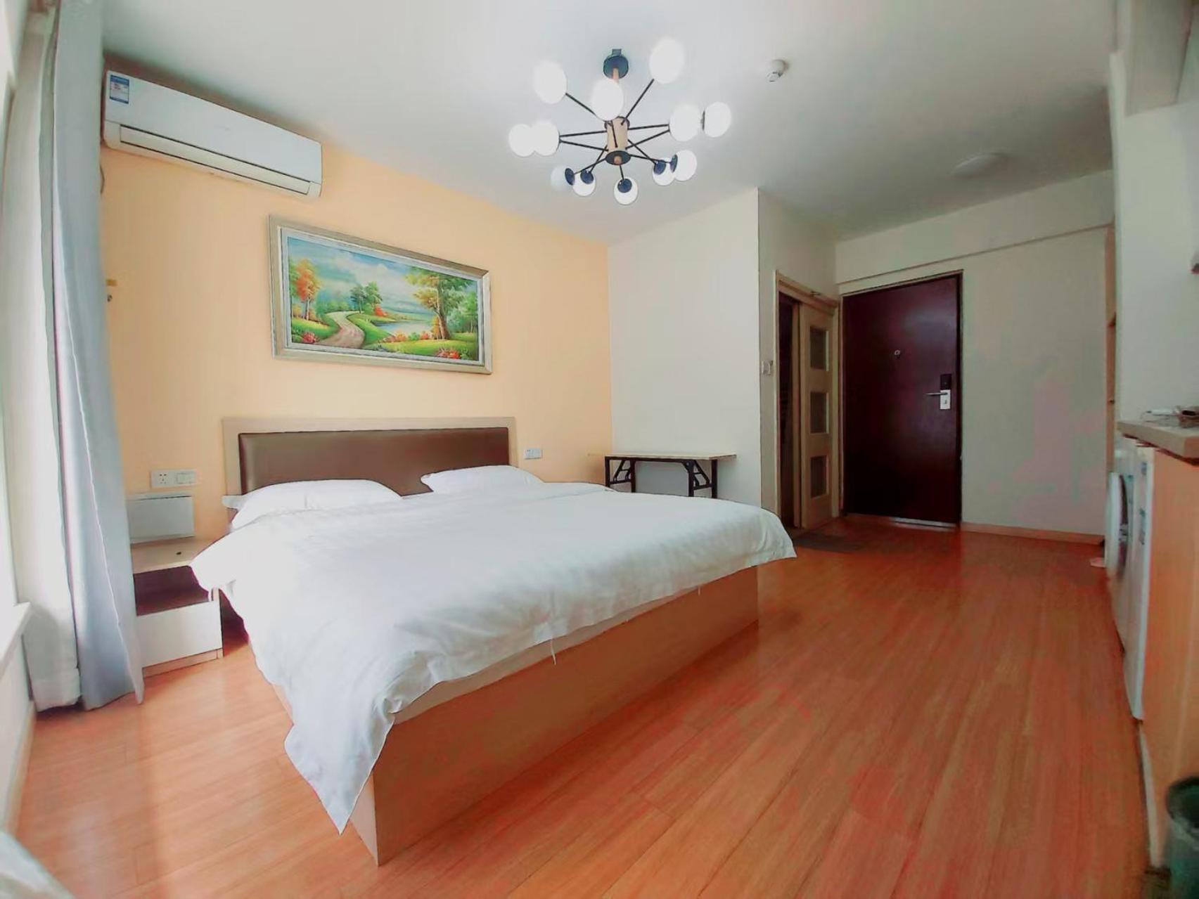 Qingdao Mi Apartment Bagian luar foto