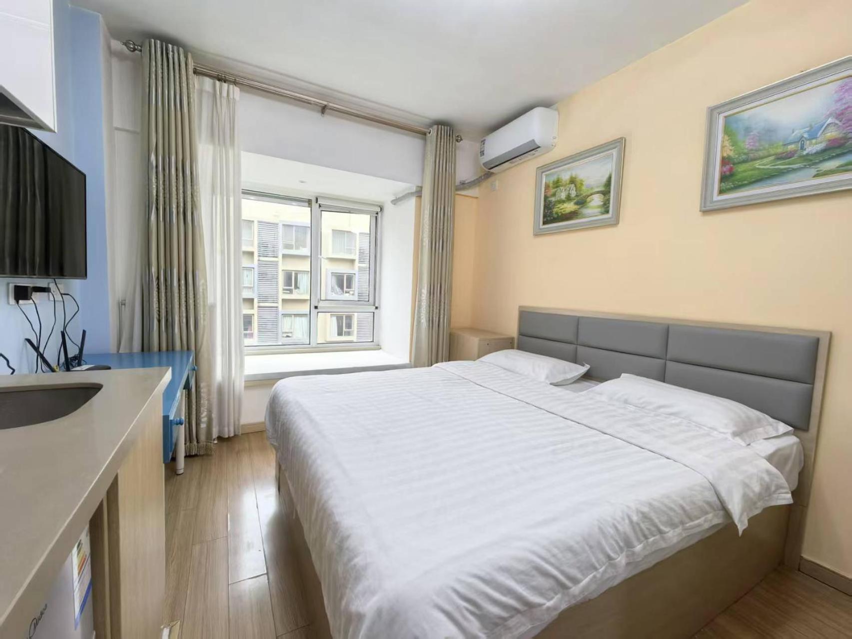 Qingdao Mi Apartment Bagian luar foto